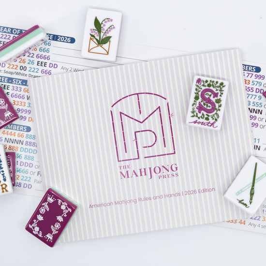 Miss Mahjong tiles and The Mahjong Press playing cards